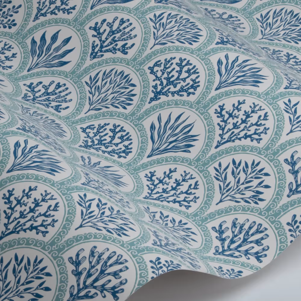 A wallcovering with a coral design in blue and aqua